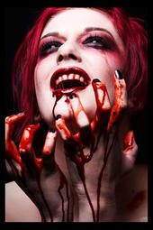 Blood never tasted so good.
A vampire is drenching herself in blood.Its good so why not drink it?
Keywords: Vampire,Blood