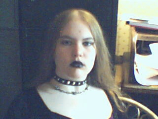 Teenage Vampire
C'est moi. [url=http://www.elliepoet.com/]Ellie Aitken[/url],
 a.k.a. the Teenage Vampire. Or that random freak. 
Whatever you prefer.
