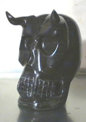 black skull
I had one piece of black soapstone left so i had to make a skull with it.  It was my forth skull i've carved so far and many more to come i'm sure.

skullhead420@hotmail.com
